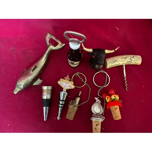 357 - Collection of vintage corkscrews, bottle stoppers and bottle openers.