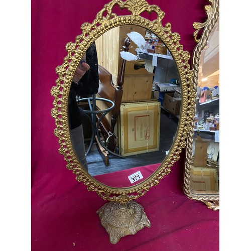 371 - Vintage Oval gilt dressing table mirror on stand. Also decorative gilt wall hanging mirror.