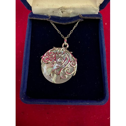446 - Sterling silver and shell pendant on sterling silver chain