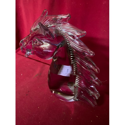 669 - Murano Horses head in purple glass signed by Licio Zanetti. 25cms. Slight damage to mane.