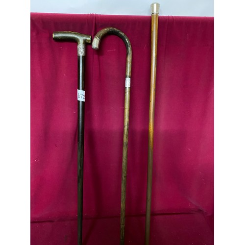 672 - 3 Antique Silver collared walking sticks, 2 with handles and 1 cane.