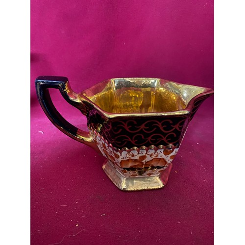 696 - Imari style teapot, water jug and milk jug