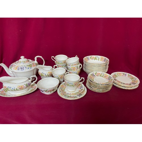 698 - Paragon teaset comprising of tea pot, gravy boat, milk jug and sugar bowl, 9 dessert bowls, 8 cups a... 