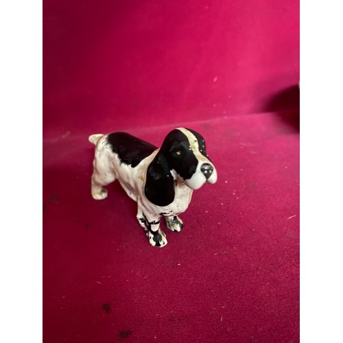 701 - A Beswick Cocker Spaniel, a Beswick 'Jemima Puddleduck' and a Royal Doulton horse