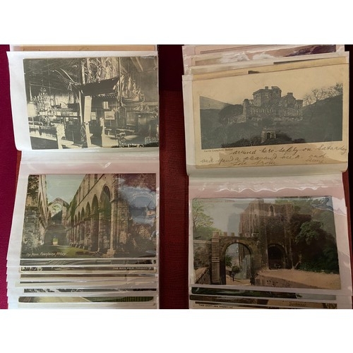 462 - 2 Albums of vintage postcards.