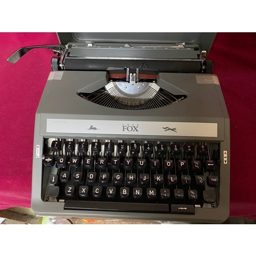 685 - WHSmith grey fox travel typewriter