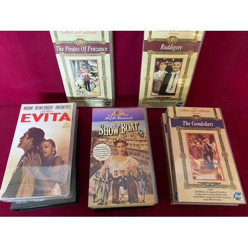 139 - 8 retro VHS videos including Gone with the Wind, Mikado, Joseph and Evita.