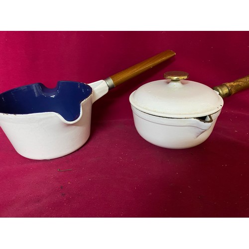 141 - Le Crueset griddle pan and serving dish. Also 2 Waterford Ireland enamel pans.