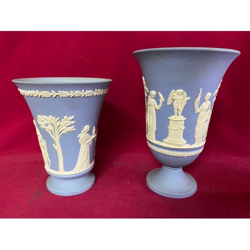 173 - 3 pieces of blue Wedgewood jasperware, 2 vases with the largest measuring 19 cms tall and a Lambeth ... 