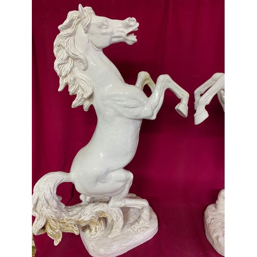 182 - Pair of stunning Montrose white ceramic horses A2229 measuring 70 cms tall. Signed by the artist.