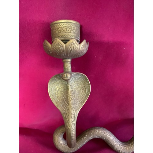 226 - Brass snake candle holder measuring 60 cms long x 29 cms tall