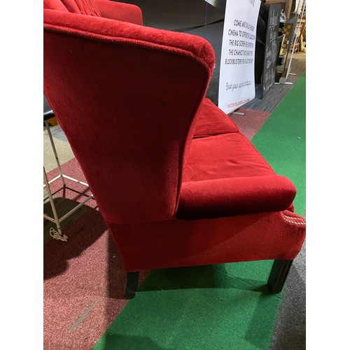 235 - Cottage style couch in red velour 2 seater with button back measuring 140 cms wide