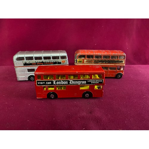 50 - Collection of die cast buses and trams.