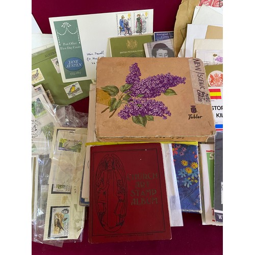 83 - Box of stamps, stamp album and first day covers.