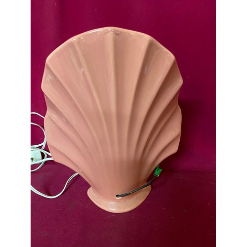 533 - Art Deco style shell lamp in pink measuring 29cms tall