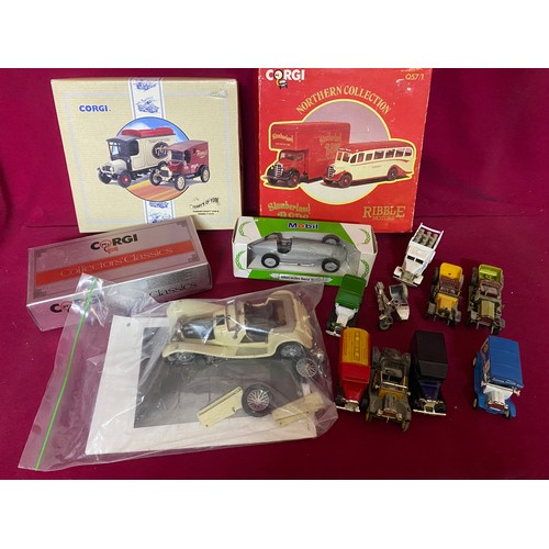 411 - Collection of boxed and loose diecast cars and trucks.