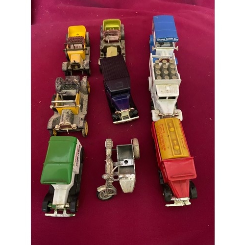 411 - Collection of boxed and loose diecast cars and trucks.