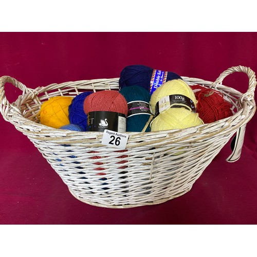 26 - Wicker basket containing 15 x 100g woollen balls of assorted colours