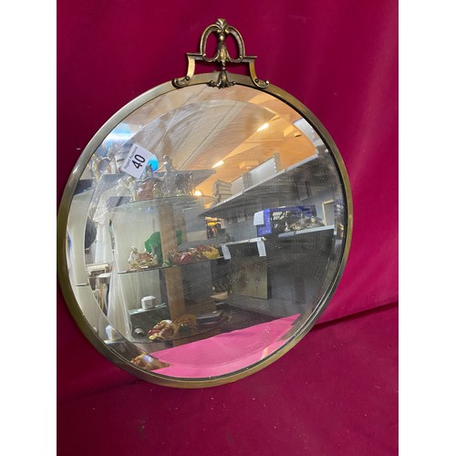 40 - Vintage round bevelled mirror with gold metal frame  measuring 48 cms diameter