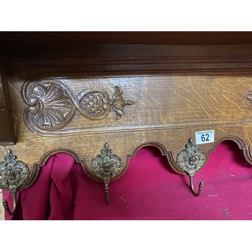 62 - Ornate hand decorated coat plate rack measuring 135 cms long