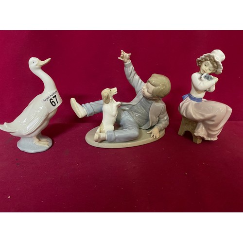 67 - 3 pieces of Nao, A 1990 Nao by Lladro 'Boy with dog' no.278 figurine, a Nao duck standing 15 cms tal... 