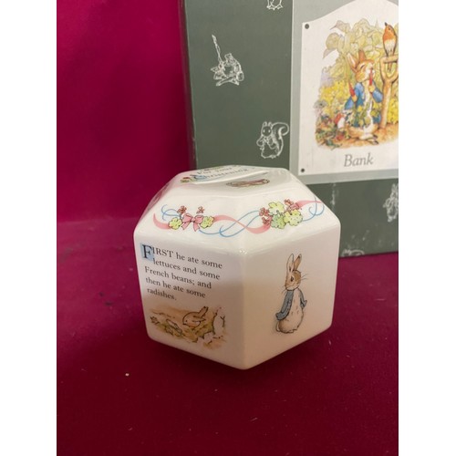 75 - 2 collectable Peter Rabbit money boxes by Frederick Warne and Co