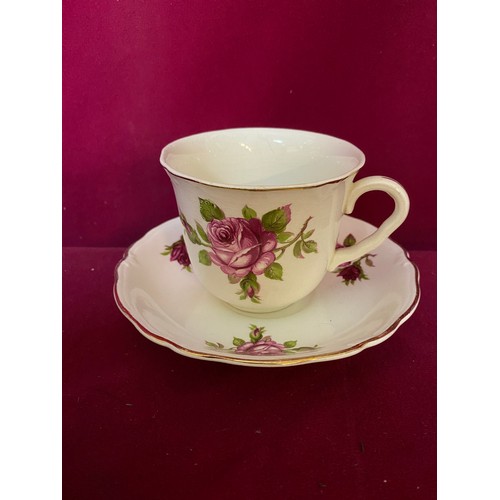 285 - Vintage Midwinter Rose teacups and saucers.