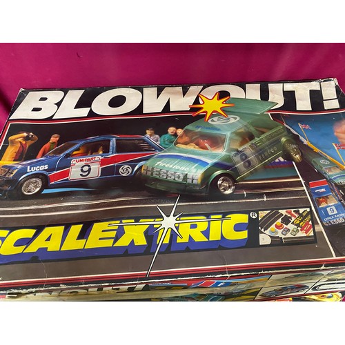 227 - 2 Scalextric sets comprising of Porsche Power and Blowout plus a Carrera Racing set.