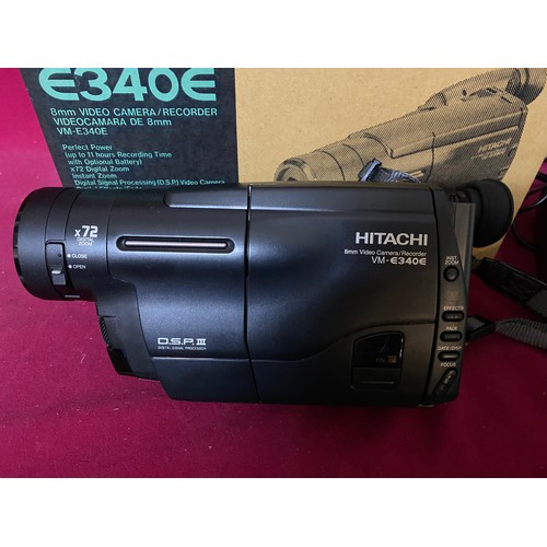 230 - Hitachi E340E Video Camcorder. The camcorder powers up, holds charge and all parts work but hasnt be... 