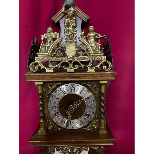 335 - Vintage Dutch Nu Elck Syn Sin wall clock measuring 64 cms tall with weights and pendulum