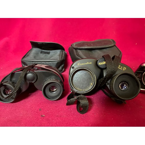 336 - 3 pairs of binoculars including an Executive 10 x 25 and a Tekoni 3.5 x 30