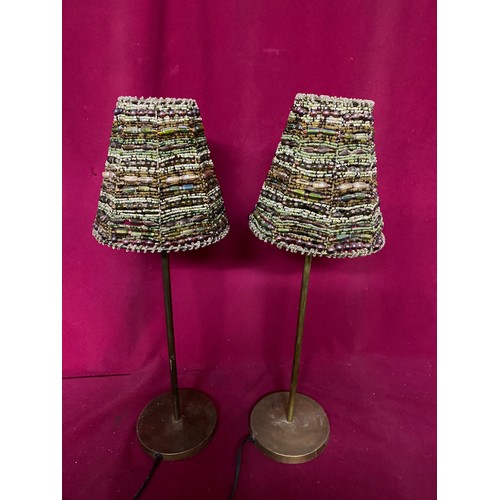 371 - Pair of table lamps measuring 48 cms tall, both working with coloured beaded shades