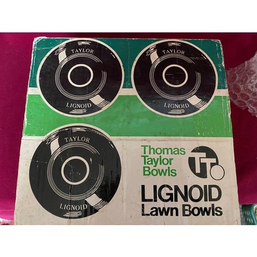 341 - Set of Thomas Taylor Lignoid lawn bowls standard