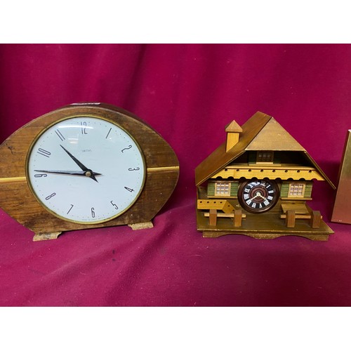 299 - Vintage Smiths wooden mechanical mantle clock, Coral 60's mantle clock and Swiss Chalet clock.