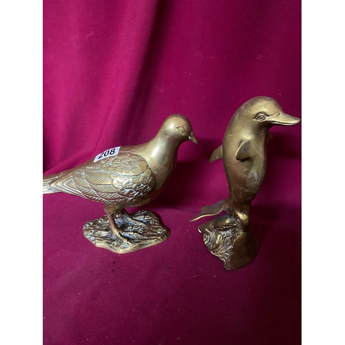 208 - 3 x pieces of vintage brassware, a dove, a dolphin and a prancing horse measuring 24 cms talll