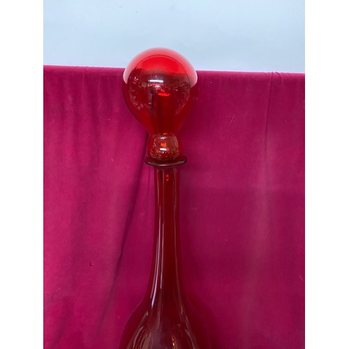 331 - Large vintage red glass apothecary jar with stopper.