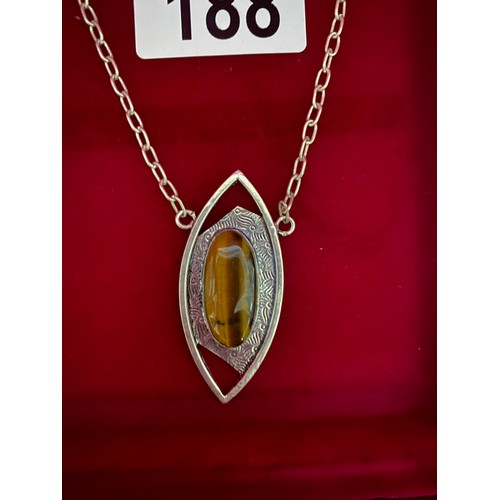 188 - Sterling silver necklace and Tigers Eye pendant.