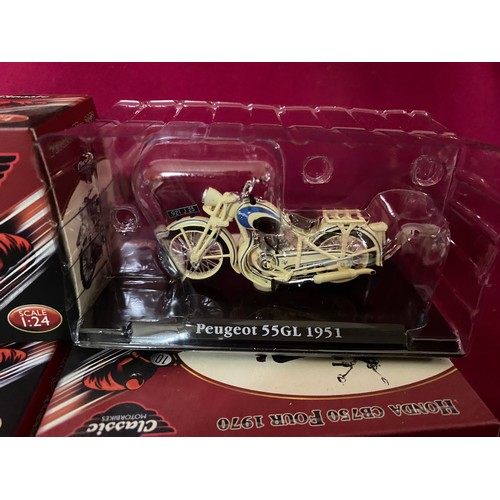 172 - Collection of 5 boxed diecast motorcycles.