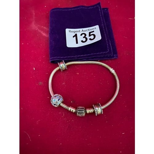 135 - Genuine Pandora Silver bracelet with charms.