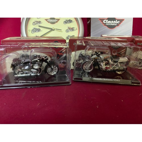 103 - Collection of diecast motorcycles, clocks and coasters.