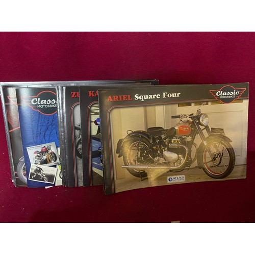 103 - Collection of diecast motorcycles, clocks and coasters.