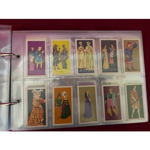 158 - Album of mint condition tea cards in complete sets in padded album, 12 sets in total.