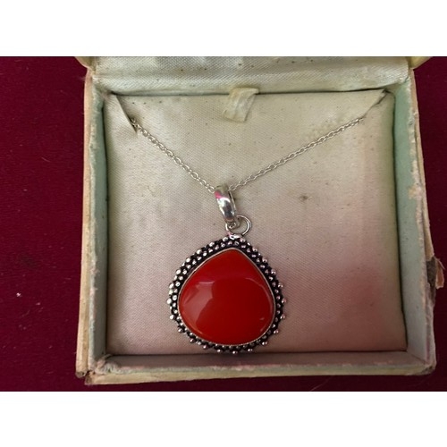 189 - Sterling Silver necklace and red coral pendant.