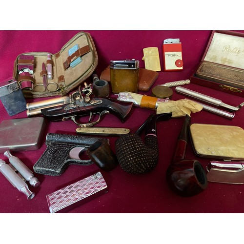 492 - Collection of smoking memorabilia, lighters, pipes and cigarette cases.