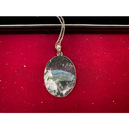 480 - Moss agate and silver pendant on sterling silver chain.