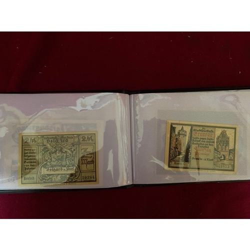 489 - 2 albums of old banknotes