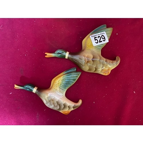 529 - Pair of Keele Street Pottery flying ducks.