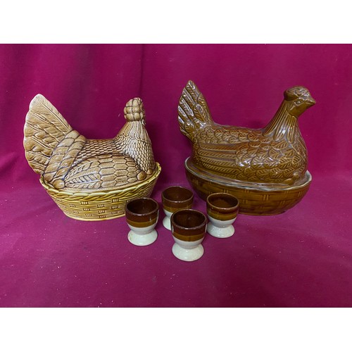 913 - 2 x vintage egg holders, one Moira and one Beswick and 4 x egg cups