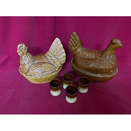 913 - 2 x vintage egg holders, one Moira and one Beswick and 4 x egg cups