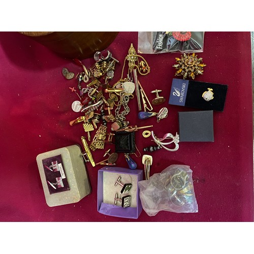 506 - Box of vintage costume jewellery comprising of cufflinks, brooches and bracelets.